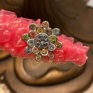 Flower shape crystal ring.